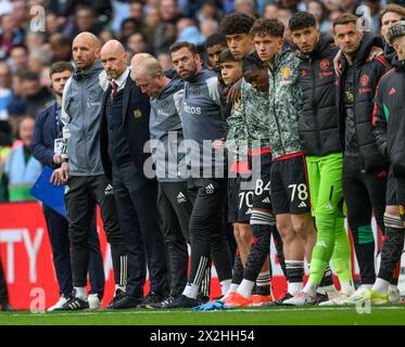 London, UK. 21st Apr, 2024 - Manchester United v Coventry City - FA Cup Semi-Final - Wembley.                                                    Manchester United Manager Erik ten Hag, his coaching staff and younger players watch on during the penalty shoot-out.               Picture Credit: Mark Pain / Alamy Live News Stock Photo