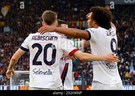 Rome, Italy. 22nd Apr, 2024. Rome, Italy, April 22, 2024. Joshua Zirkzee, right, of Bologna, celebrates with his teammates after scoring during the Italian Serie A football match between Roma and Bologna at the Olympic Stadium. Credit: Riccardo De Luca - Update Images/Alamy Live News Stock Photo