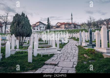 15 March 2024, Sarajevo, Bosnia and Herzegovina: muslim tombstones in the graveyard near mosque Stock Photo