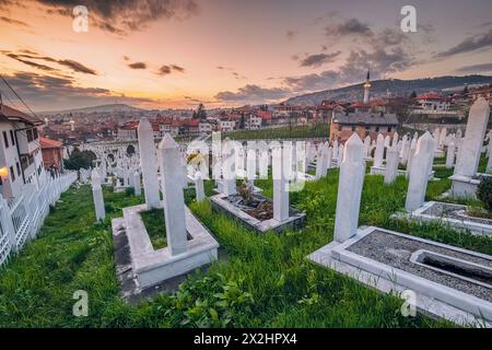 15 March 2024, Sarajevo, Bosnia and Herzegovina: muslim tombstones in the graveyard near mosque Stock Photo