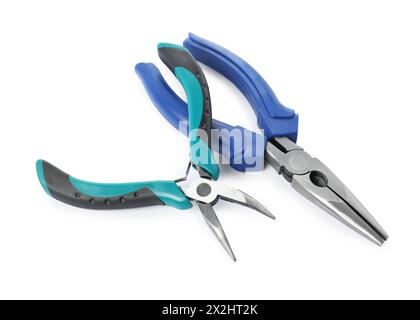Different pliers isolated on white. Construction tool Stock Photo
