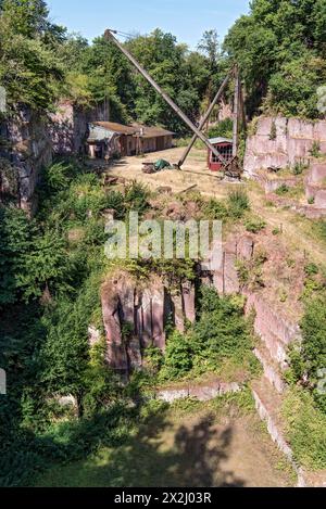 Disused Michelnau quarry, Michelnau tuff, red basalt, red lava, cinder agglomerate, Tertiary volcano, geotope, wooden crane, derrick crane Stock Photo