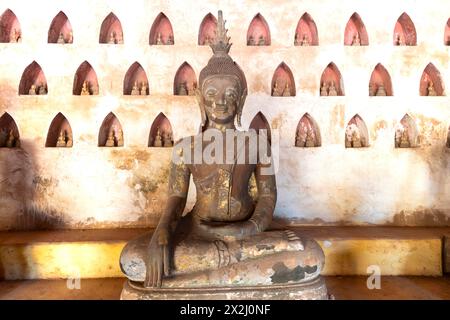 Ancient Buddha statues in the courtyard of Wat Si Saket, Vientiane, Vientiane province, Laos Stock Photo