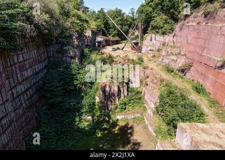 Disused Michelnau quarry, Michelnau tuff, red basalt, red lava, cinder agglomerate, Tertiary volcano, geotope, wooden crane, derrick crane Stock Photo