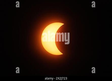 Total eclipse of the Sun, Solar eclipse 2024; seen from Torreon, Northern Mexico. Partial eclipse about 40 minutes before totality; Stock Photo