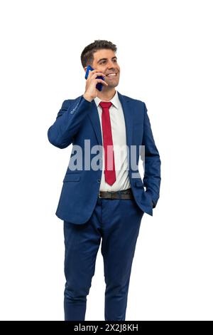 vertical Professional businessman dressed in a suit, engaged in a phone call using his smartphone, portraying communication and connectivity in the bu Stock Photo