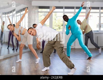 Young Asian man practicing modern street dancing in studio Stock Photo