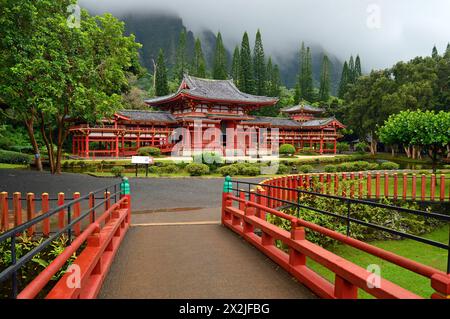 The beautiful Asian inspired Byodo-in Buddhist Temple in the Valley of the Temples; rests in a fog shrouded valley in Hawaii Stock Photo