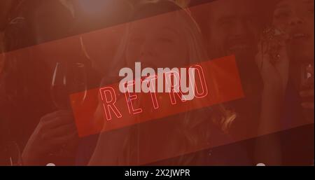 Image of neon retro text in red over smiling friends at party Stock Photo