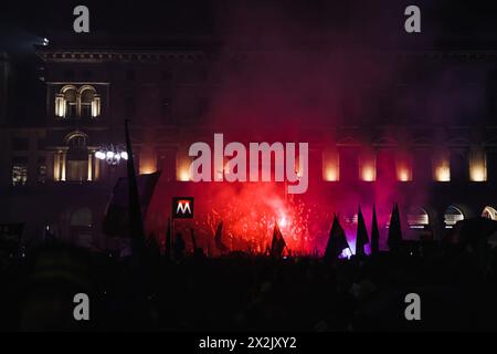 Milan, Italy. 23rd Apr, 2024. Milan, The celebration for FC Internazionale's twentieth championship after the Derby won against Milan in Piazza Duomo. In the photo: Fans celebrate in Piazza del Duomo Credit: Independent Photo Agency/Alamy Live News Stock Photo