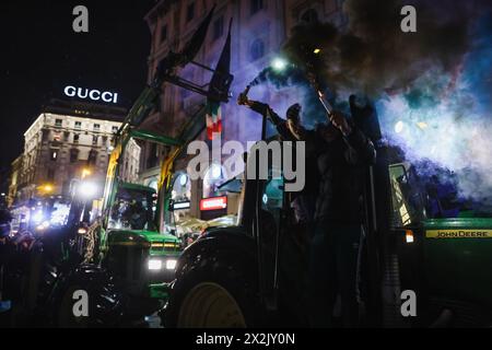 Milan, Italy. 23rd Apr, 2024. Milan, The celebration for FC Internazionale's twentieth championship after the Derby won against Milan in Piazza Duomo. In the photo: Fans celebrate in Piazza del Duomo Credit: Independent Photo Agency/Alamy Live News Stock Photo