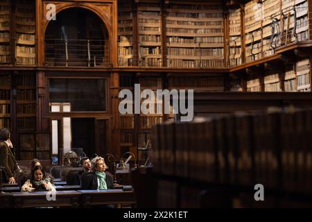Rome, Italy. 22nd Apr, 2024. People listen to a lecture at the Biblioteca Angelica library in Rome, Italy, April 22, 2024. Biblioteca Angelica, founded in 1604, is the oldest public library in Rome. This year's World Book Day falls on Tuesday. Credit: Li Jing/Xinhua/Alamy Live News Stock Photo