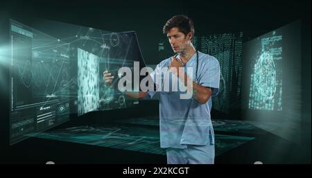 Image of biracial male doctor over data processing Stock Photo