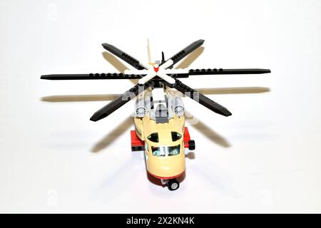 Children's toy helicopter assembled from plastic parts, top view. Stock Photo