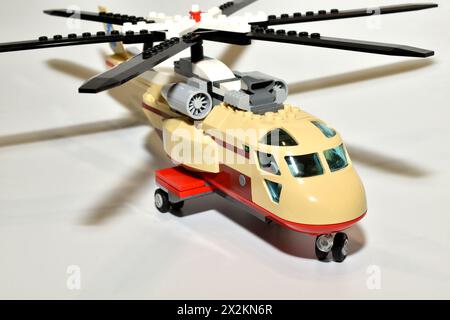 Children's toy helicopter assembled from plastic parts, side view. Close-up. Stock Photo