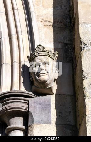 Head of Prince Philip at the main entrance to Chichester Cathedral, Chichester, West Sussex, England Stock Photo