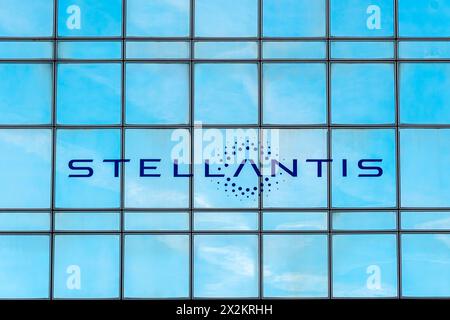 Sign and logo on the French headquarters of Stellantis in Poissy, France. Stellantis is a multinational automobile group Stock Photo