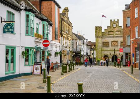 View of Market Square and the Old Town Hall from the cobbled Carfax in the historic market town of Horsham in West Sussex, England. Stock Photo