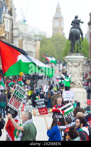 Backdropped by Elizabeth Tower housing Big Ben, pro-Palestinian protesters march during their NAKBA 75 – National Protest in London. Stock Photo
