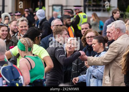 Actor Jamie Borthwick playing the part of Jay Brown whilst participating in the TCS London Marathon 2024, with supporters at Tower Hill, London, UK. Stock Photo