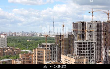 Construction of new apartment buildings in residential area Stock Photo