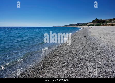 ITALY, Calabria, ionian sea coast, beach near Reggio Calabria, sicilian volcano Etna in the background Stock Photo