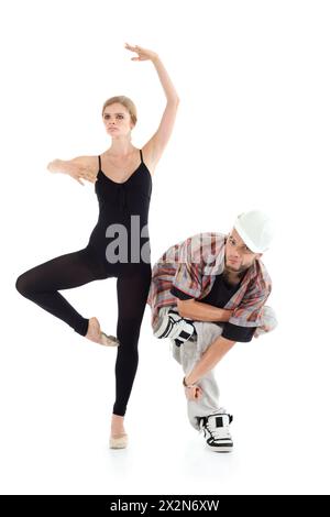 Graceful ballerina and breakdancer in helmet poses isolated on white background. Stock Photo