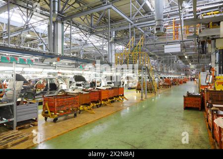 TOGLIATTI - SEPTEMBER 30: Large light workshop for passenger car assembly at Avtovaz factory on September 30, 2011 in Togliatti, Russia. LADA brand in Stock Photo