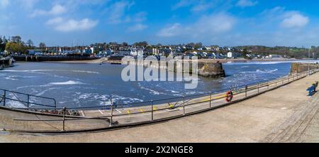 A panorama view from the outer harbour wall towards the village of Saundersfoot, Wales on a bright spring day Stock Photo