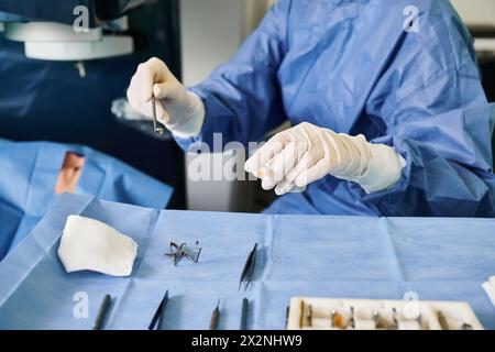 Surgeon in surgical attire preparing for laser vision correction procedure. Stock Photo