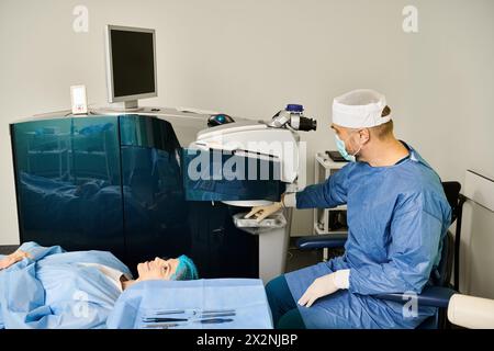 A person in a surgical gown operating a machine for laser vision correction. Stock Photo