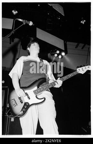 MANIC STREET PREACHERS, POST-RICHEY COMEBACK GIG, 1996: Nicky Wire of Welsh band Manic Street Preachers playing as support to Oasis at Cardiff International Arena, Wales, UK on 19 March 1996. Photo: Rob Watkins.  INFO: This concert was the Welsh band Manic Street Preachers return to touring as support to Oasis after the disappearance one year earlier of their lyricist Richey Edwards. They unveiled songs like 'Design For Life' from their iconic 'Everything Must Go' album on this tour. Stock Photo