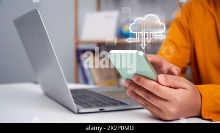 Businesswoman downloading business data from internet network showing usage of big data network and cloud computing system. Stock Photo