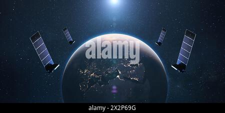 Satellites In Orbit Of Planet Earth With The Lights Of The Night Cities Of Europe. Satellite Internet Connection. Stock Photo