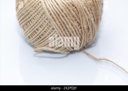 Skein of jute twine on a white background. Stock Photo