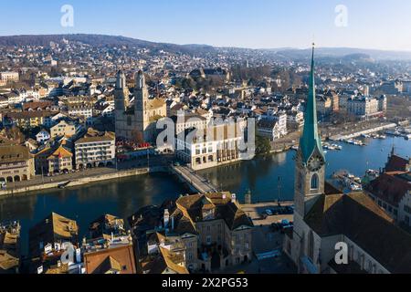 Zurich old town aerial panorama around the Limmat river with the Fraumünster   church, the Grossmunster cathedral and the Münsterbrücke bridge in Swit Stock Photo