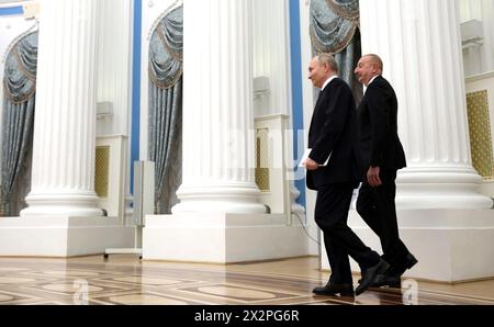 Moscow, Russia. 22nd Apr, 2024. Russian President Vladimir Putin, left, and Azerbaijan President Ilham Aliyev arrive together to a meeting with veteran builders and workers of the Baikal-Amur railway line to mark the 50th anniversary of the construction start at the Kremlin Grand Palace, April 22, 2024, in Moscow, Russia. Credit: Gavriil Grigorov/Kremlin Pool/Ģ����ý Live News Stock Photo