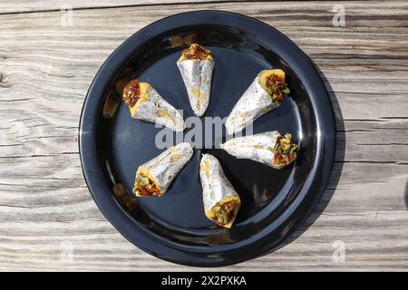 Paan flavoured Indian sweets. Paan barfi stuffed with Gulkand paan flavor. Paan burfi in dish Stock Photo