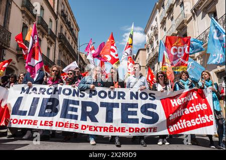 Sophie Binet in the procession, behind the banner,  Let s march for our freedoms,, against extreme right-wing ideas, Anti-racist, anti-fascist Herault. Unity march for our freedoms and against far-right ideas, in the presence of Sophie Binet, organized in Beziers by unions and associations. France, Beziers April 23, 2024.  Photograph by Patricia Huchot-Boissier / Collectif DyF. Stock Photo