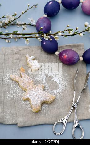 Wreath made of Easter eggs and bunny shaped cakes Stock Photo