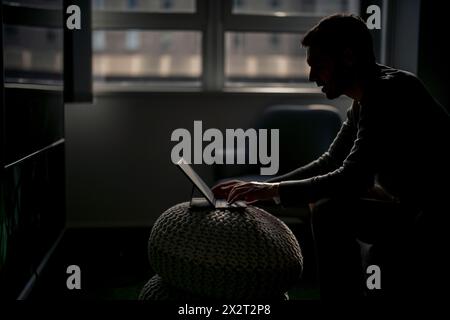 Mature businessman working on tablet PC Stock Photo