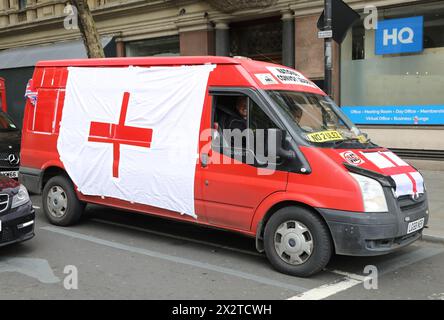 The National Convoy leader van of the Stop Khan Anti Ulez group drives around Trafalgar Square on St George's Day 2024, with the Mayoral elections approaching, London, UK Stock Photo