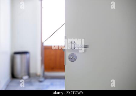 close-up of the door lock to the toilet room. Repair and reliability Stock Photo