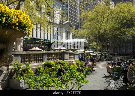 Bryant Park is an urban oasis behind the main building at the New York Public Library in Midtown Manhattan, 2024, spring time, New York City, USA Stock Photo