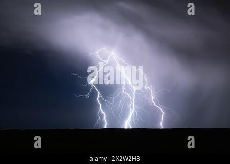 Forked lightning strike from an electrical storm near Shiprock, New Mexico, USA Stock Photo