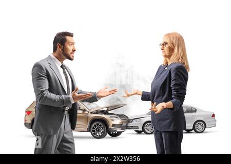 Businessman a woman figthing after a car crash isolated on white background Stock Photo