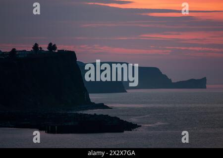 15.07.2019, Ballycastle, Northern Ireland, United Kingdom - Evening twilight on the coast of the Irish Sea, Glenarm Marina in front. 00A190715D400CARO Stock Photo