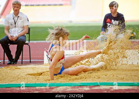 MOSCOW - JUN 11: Female jumper in sandpit at Grand Sports Arena of Luzhniki OC during International athletics competitions IAAF World Challenge Moscow Stock Photo