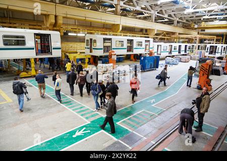 MYTISHCHI - APR 18: Visitors and press representatives in workshop of Mytishchi Machine-building factory, April 18, 2012, Mytishchi, Russia. The plant Stock Photo