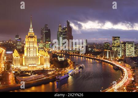 MOSCOW - NOVEMBER 13: Hotel Ukraine and Moscow City business complex at evening, on November 13, 2012 in Moscow, Russia. 25 buildings built in Moscow Stock Photo